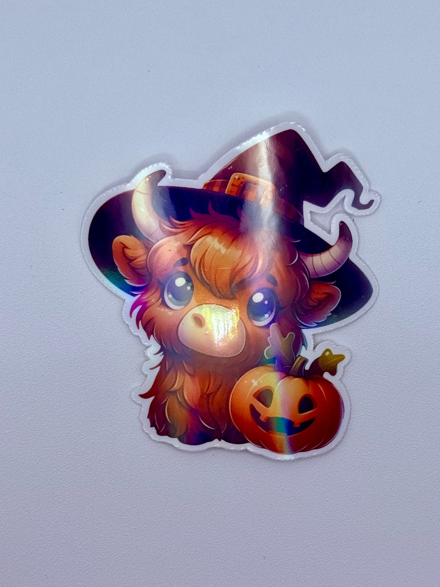 Highland Cow Witch Sticker – Cute Halloween Pumpkin Vinyl Decal, Spooky Fall Aesthetic, Kawaii Cow Sticker for Laptop & Water Bottle